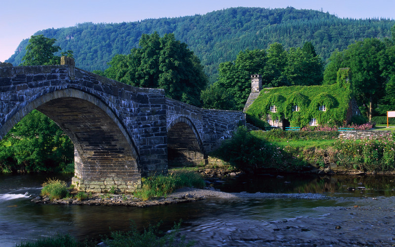 Arch Bridge and Moss Covered House, Wales, UK Arch Bridge and Moss Covered House, Wales, UK